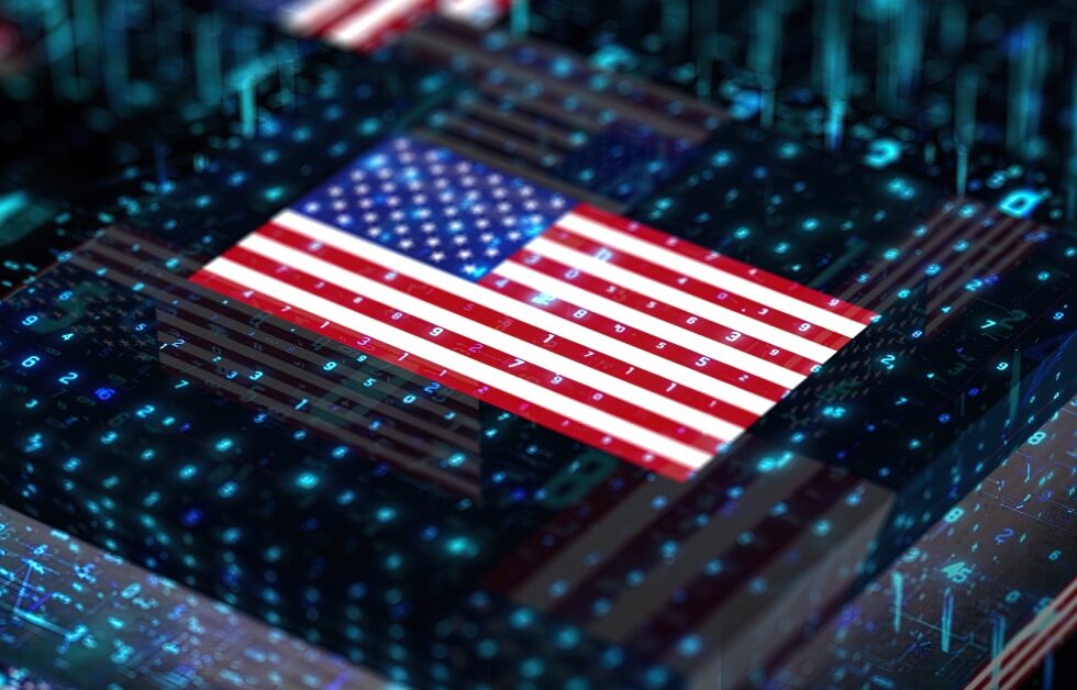A digital illustration of the United States flag composed of colorful pixels. The flag is set against a background filled with numerical data and binary code, symbolizing technology and digital information.